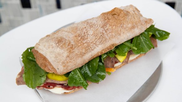 The deli sandwich incorporates kangaroo saucisson, a slow-aged, air-dried sausage.