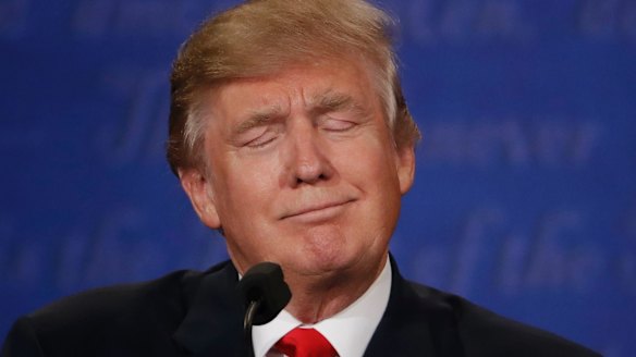 Donald Trump repeatedly interjected "wrong" as Hillary Clinton spoke.