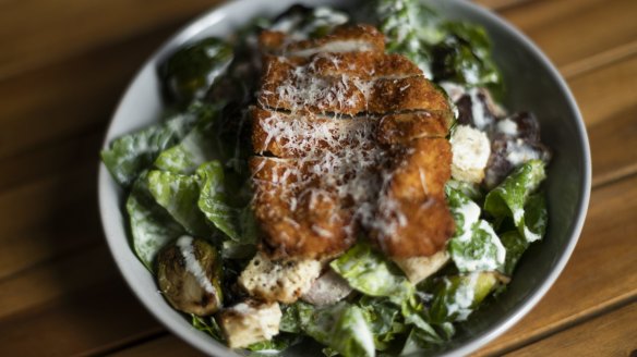 Charred brussels sprouts Caesar with optional schnitty.