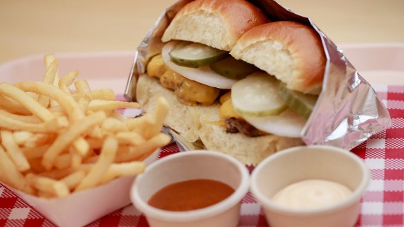 Beatbox Kitchen's snack-sized cheeseburgers with a side of fries.