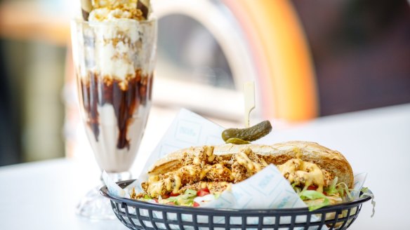 Cajun fried shrimp po' boy with a chocolate milkshake.