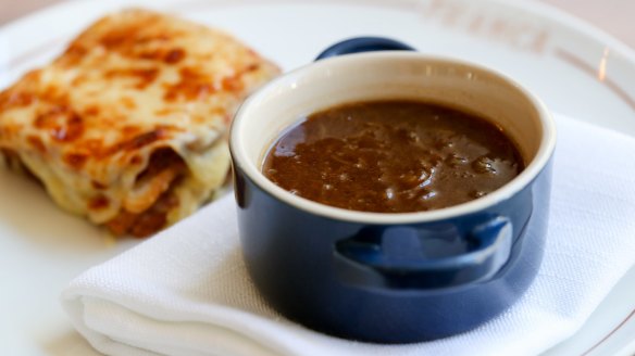 French onion soup comes with a croque-monsieur on the side.