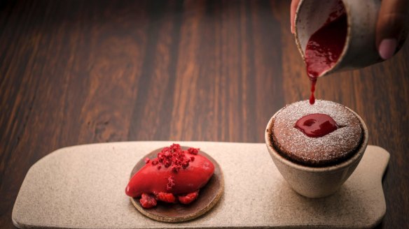 Valrhona souffle with raspberry sorbet.