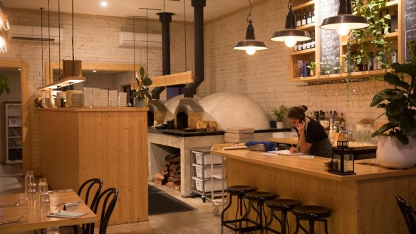 Woodcutters Kitchen with its two wood-fired ovens.