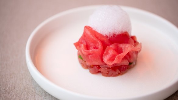 Go-to dish: Yellowfin tuna, slightly dried ox heart tomato and burrata and basil foam.