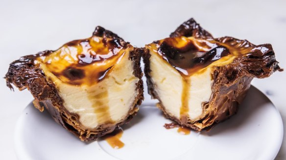 A cross-section of the Portuguese tart with miso caramel.