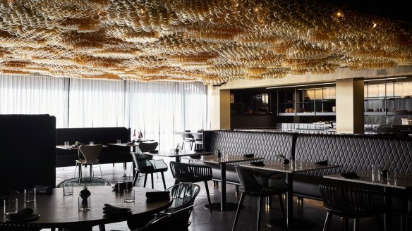The dining room at Doot Doot Doot features a striking ceiling art installation, Fermentation.