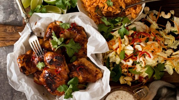 Vietnamese lemongrass chicken with red rice and coleslaw.