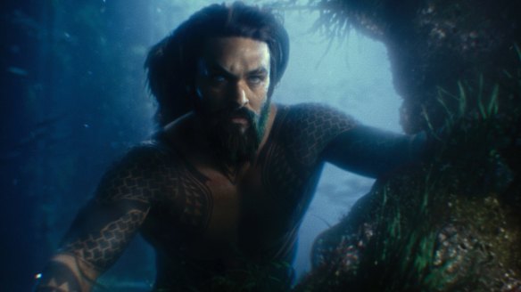  Aquaman (Jason Momoa) provides back-up muscle.