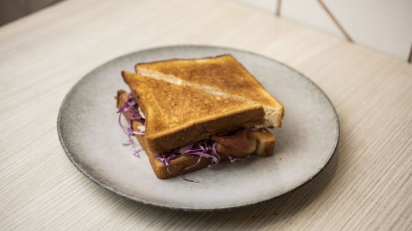 Egg and bacon sandwich on thick-cut milk bread.