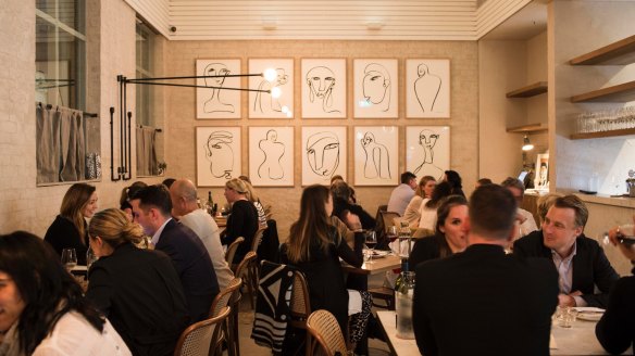 A wall of Picasso-like sketches inside the revamped Paddington Inn.