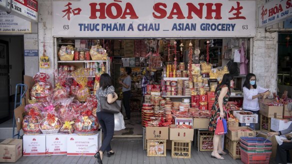 Lunar New Year sweets surround the entrance of Hoa Sanh grocery in Cabramatta.