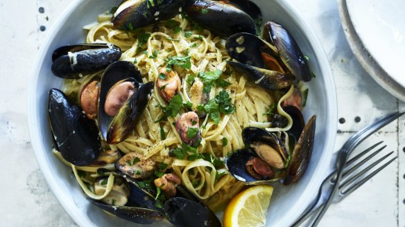 Remove half the mussels from their shells for easy eating.