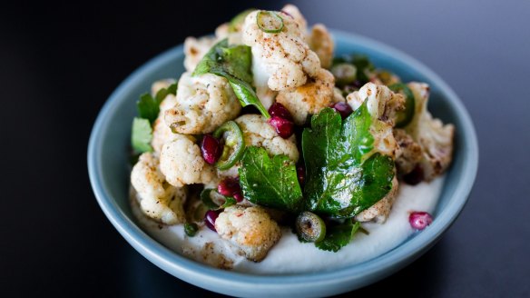 Spiced cauliflower with pomegranate and goat curd at Eightysix in Braddon