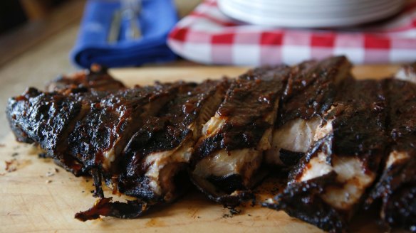 Hickory-smoked spare ribs sliced and ready to serve. 