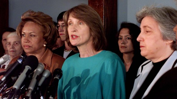 Then National Organisation for Women president Patricia Ireland, centre, calls on the Republican Congress to drop efforts to impeach Bill Clinton in 1998.