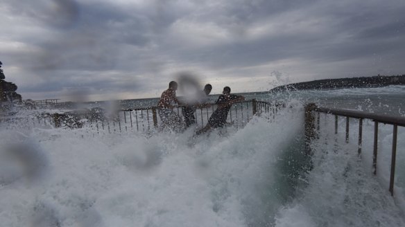 A number of people jumped into the water to save the swimmer at Queenscliff.