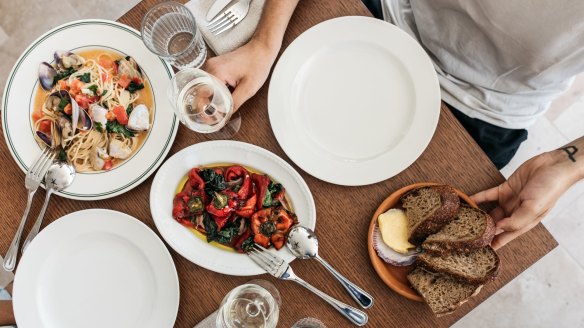 Spaghetti, clams and tomatoes with charred peppers and Berkelo sourdough country loaf. 