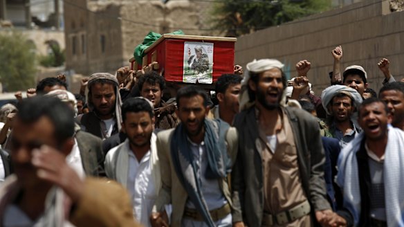 Shiite rebels, known as Houthis, carry the coffin of a fellow Houthi who was killed during fighting against  Saudi-backed Yemeni forces in Marib province.