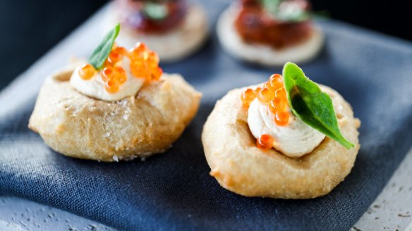 Little snacks of pizze fritte with a lush taramasalata.