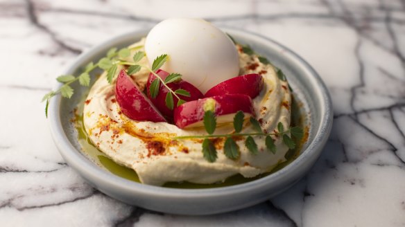 Don't miss the fresh hummus with radishes and smoked egg at Ezra.