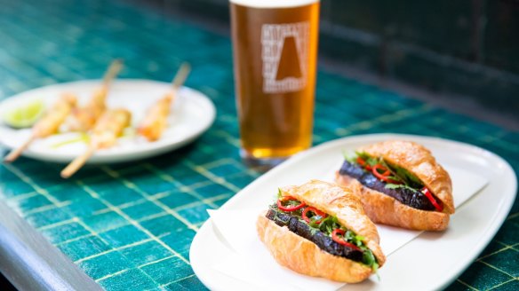 Grilled king prawn skewers and the Indochina (beef cheek in a croissant) with an IPA at Atomic Beer Project.