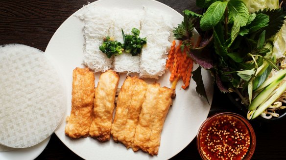 Signature banh hoi chao tom (DIY ricepaper rolls with steamed rice noodle cakes and sugar-cane prawns).