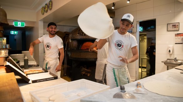 Pizzaiolo in action at Via Napoli restaurant in Surry Hills, Sydney.