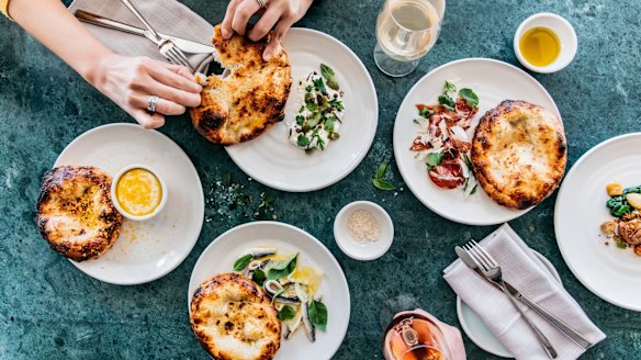 The now pizza-free wood-fire oven is turning out bread instead.