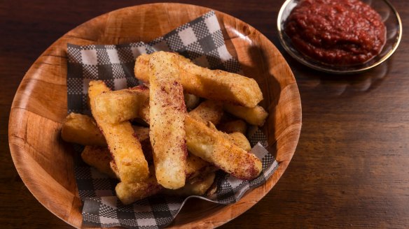 Haloumi fries with red pepper and pomegranate dipping sauce.