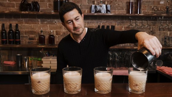 Colin Dahl, founder and chief product scientist of OPPIL, makes a whiskey sour.