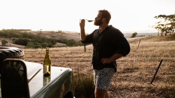 Jono Hersey samples chablis off the back of a ute.