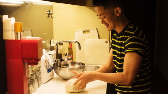 Benjamin Law working on his sourdough at home.