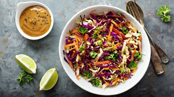 Don't like the smell of cooked cabbage? Try Asian coleslaw with sesame and peanut butter dressing.