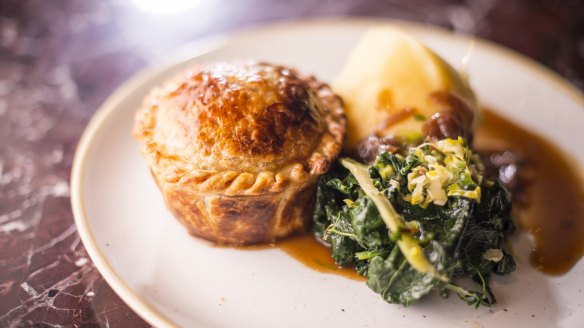 Beef and Guinness pie with buttered cabbage and silverbeet and mashed potato ticks all the pie boxes.