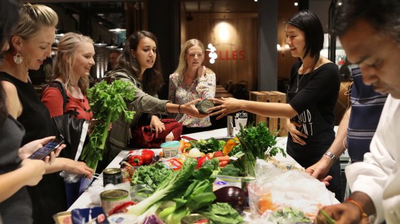Cookluck Club members share food and recipe ideas at a Youth Food Movement feature event. 