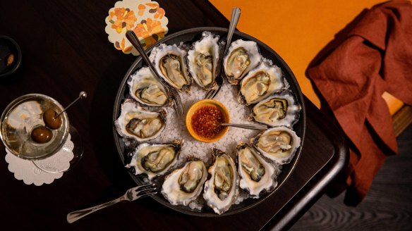 Sydney rock oysters with desert lime and apple vinegar condiment.