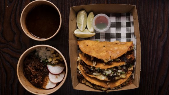 Ramen soup and beef birria tacos.