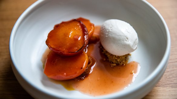 Almond ice-cream with vanilla praline and roasted peach.