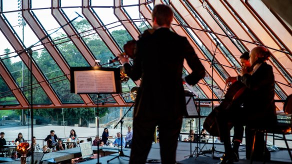 Sydney Symphony Orchestra musicians treating Bennelong guests to dinner and a show.