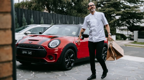 Mister Bianco chef and owner Joseph Vargetto in one of the six Mini Coopers he and his team use for their food deliveries during lockdown.