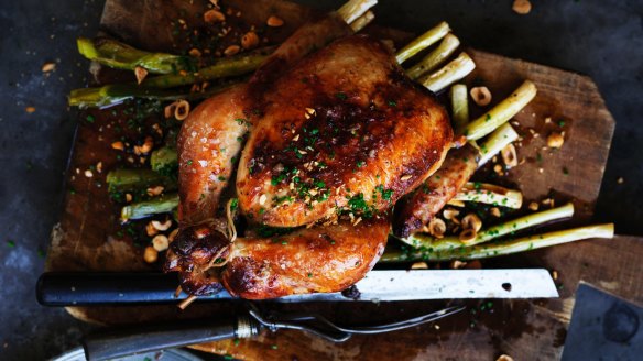 Neil Perry's roast chicken with apple cider leeks and hazelnuts.