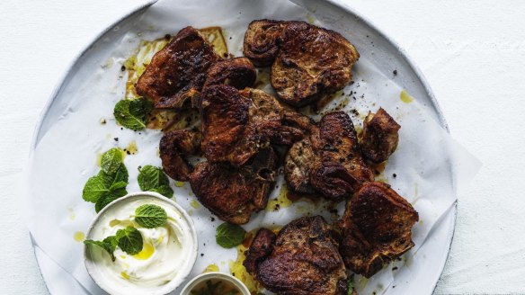 Lamb chops with mint sauce and yoghurt.