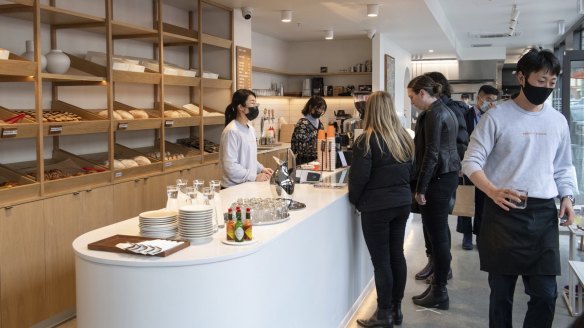 Baked goods are displayed behind glass like sculptures or artefacts at Baguette Studios.