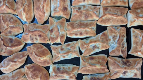 Savoury treats: Mixed cheese and spinach pies at El-Zahraa Bakery.