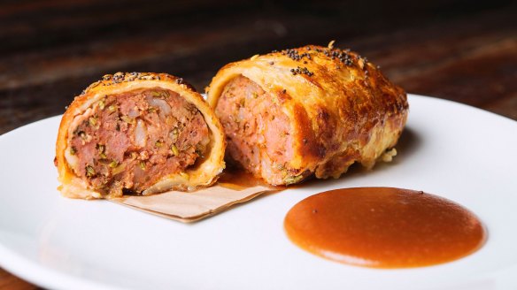 Suckling pig sausage roll with roasted apple sauce.