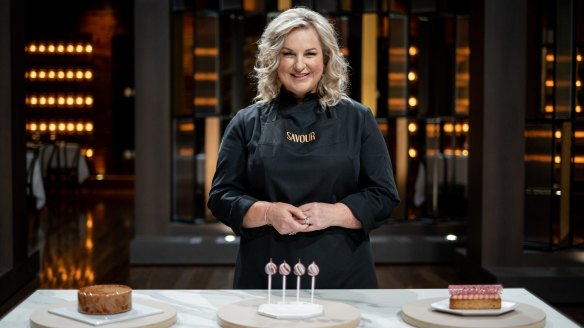 Kirsten Tibballs, and her predatory smile, pictured with her trio of desserts: Exotique mousse cake; Style Rebellion lollipops and Ruby financier.