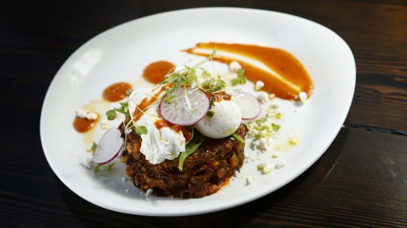 The big, burger-like corn fritters at The Sawmill in West Pymble.