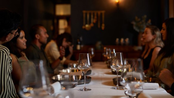 The communal table at Enter Via Laundry.