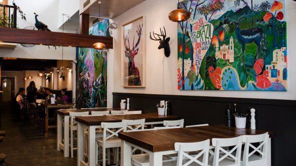 Bench seating and bright artworks are part of the rejuvenated Elk and Pea. 